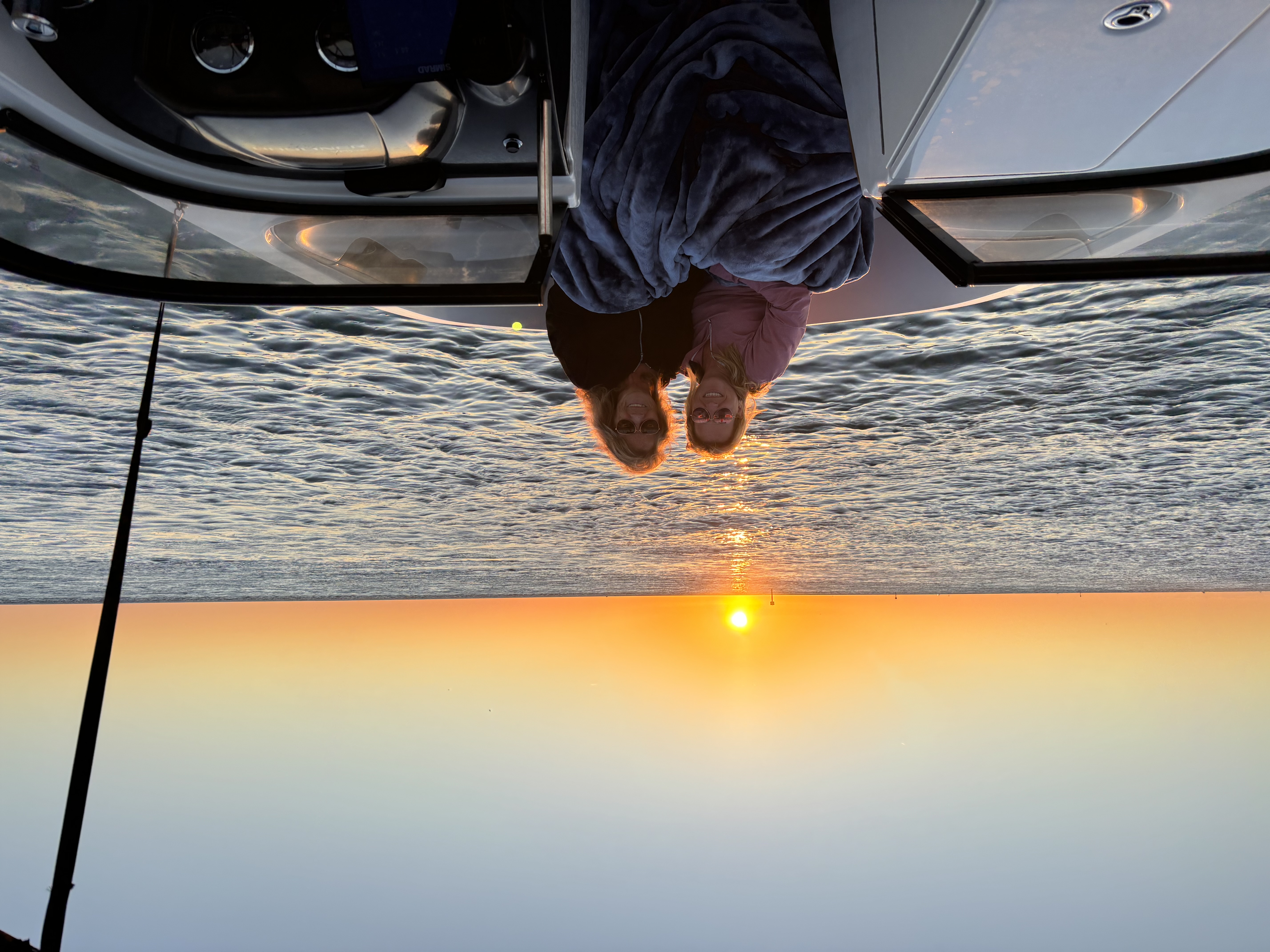 The sun sets over the water during a St. Pete Sun Cruise evening tour.